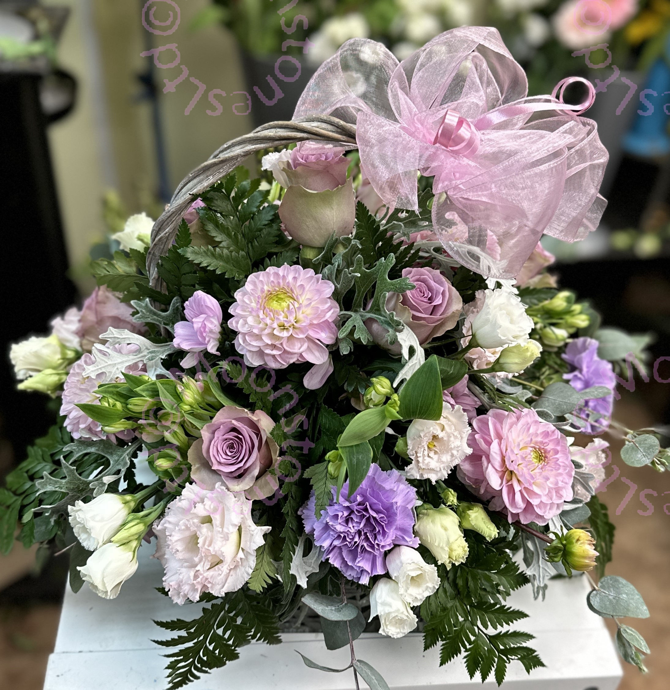 floral basket by moonstones florist