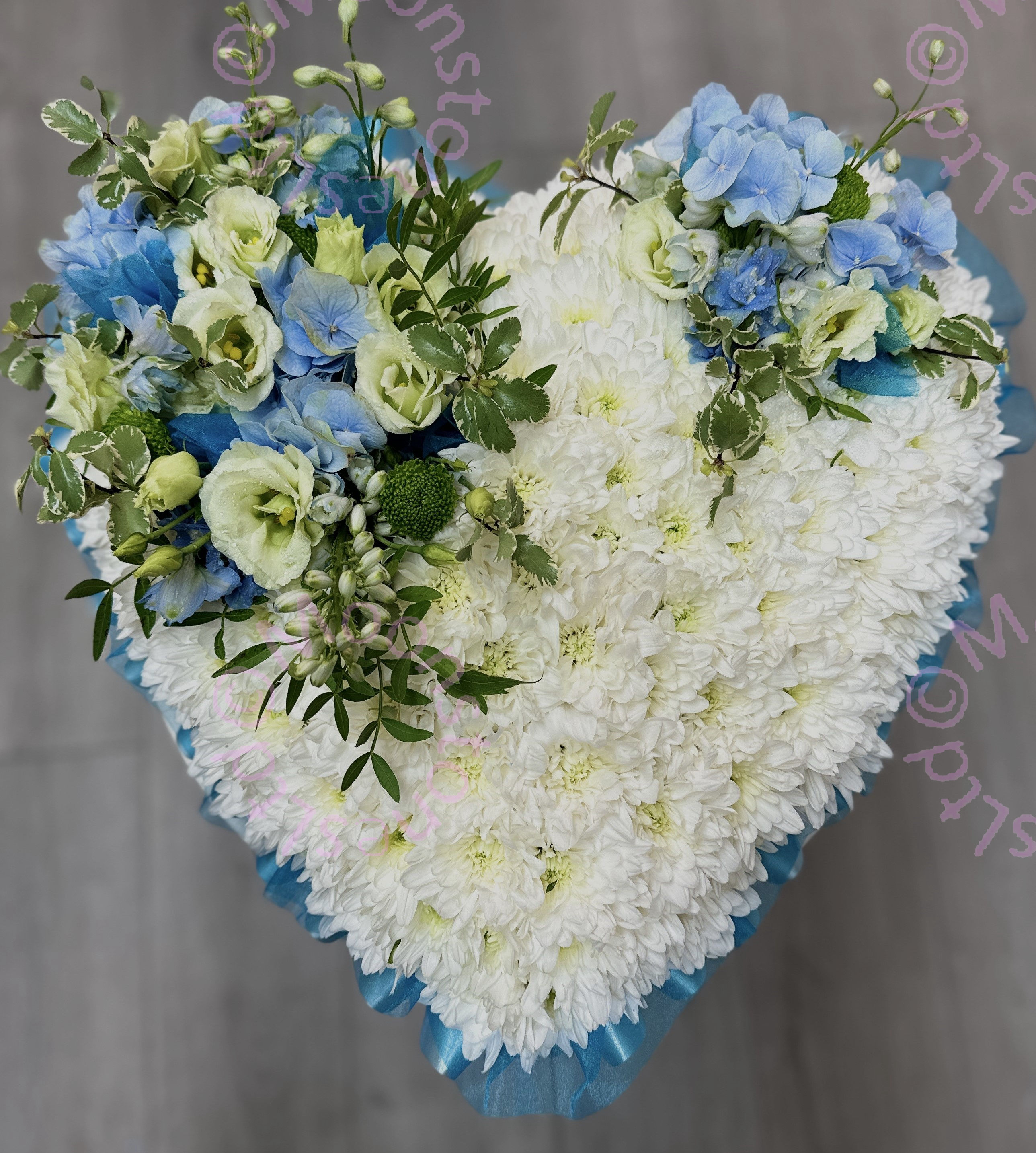 Blue and white heart tribute